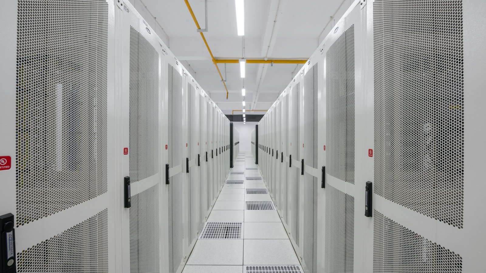 Rows of data-storage racks at Pi Data Centers in Amravati, India.