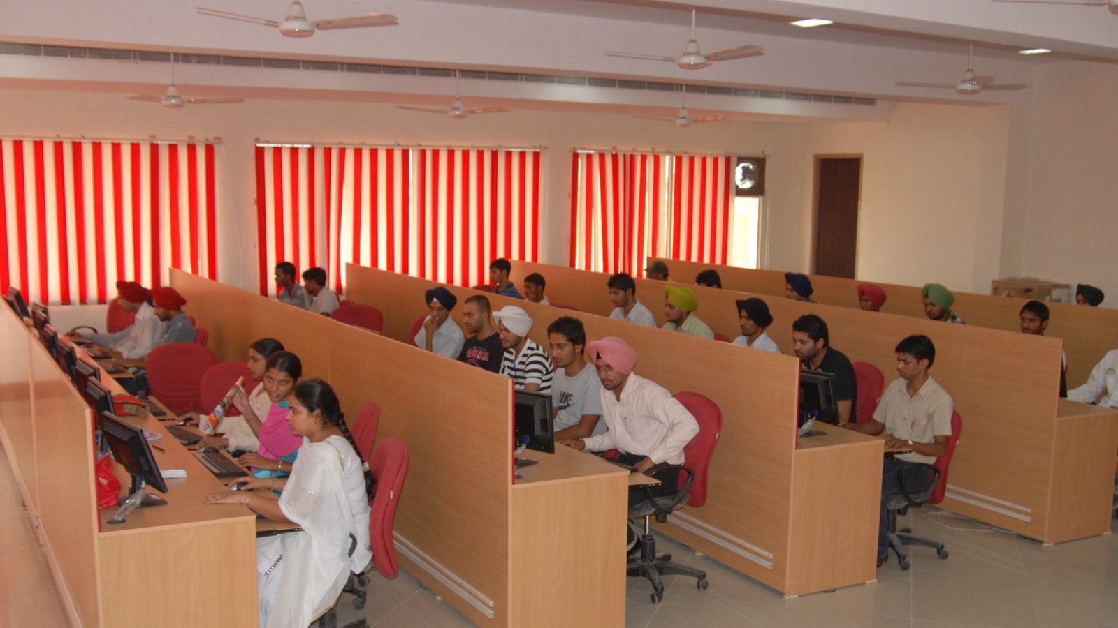 Students working in a university computer laboratory