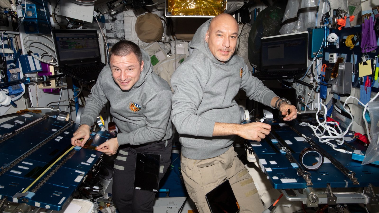 NASA astronauts Andrew Morgan and Luca Parmitano working inside the International Space Station