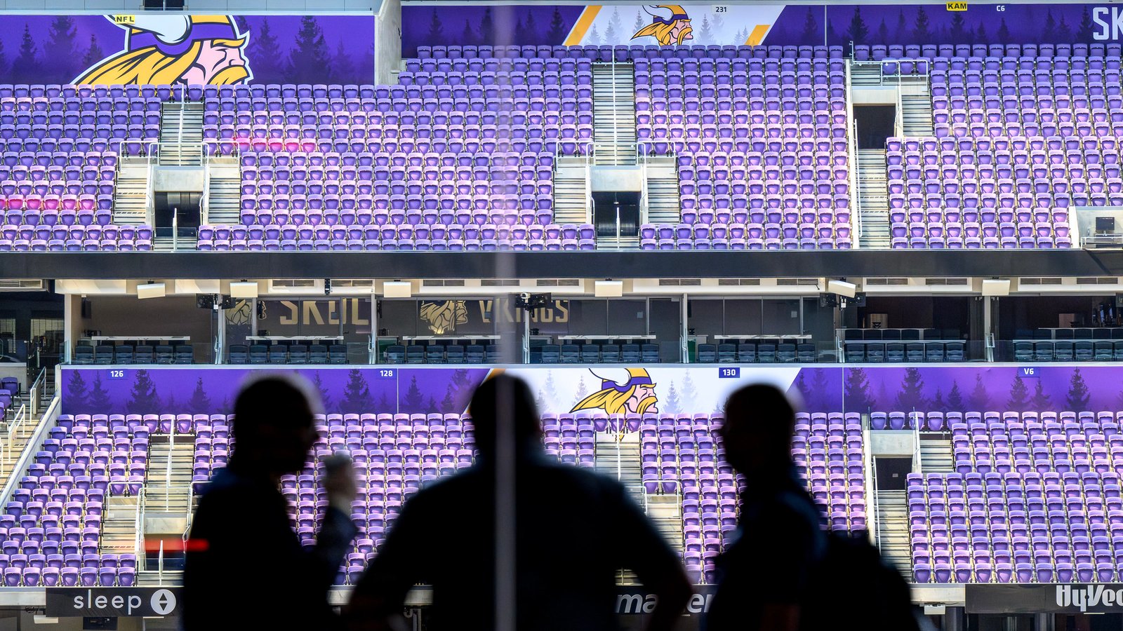 Landscape view of purple seating and Minnesota Vikings branding inside U.S. Bank Stadium.